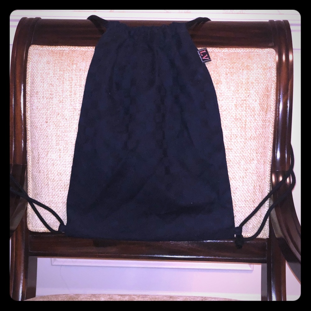 Louis Vuitton drawstring bag with wristband